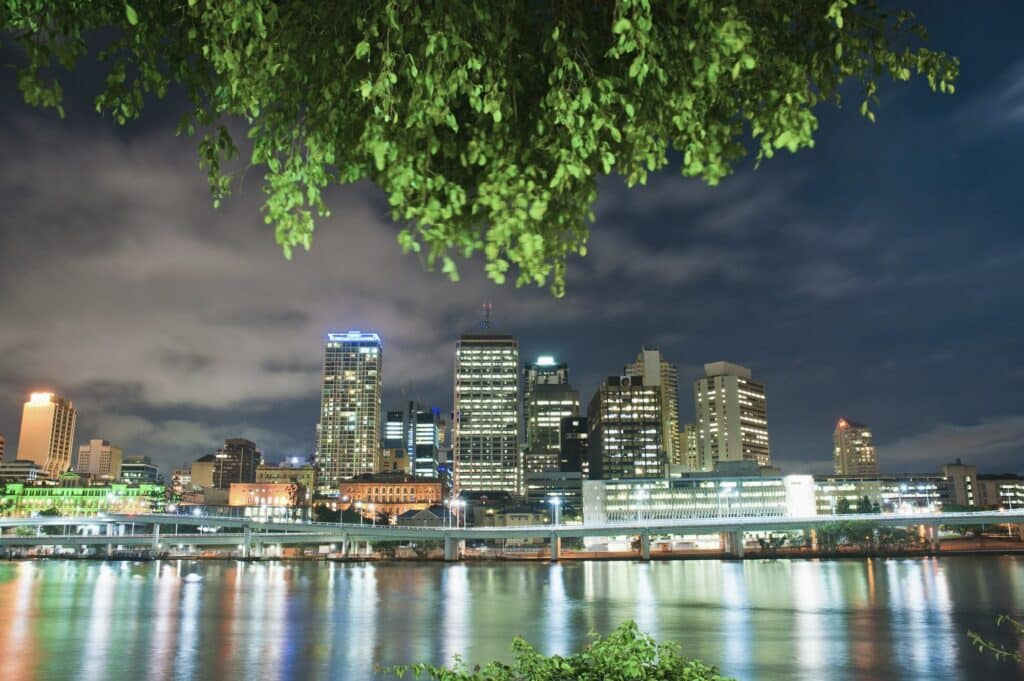 Brisbane skyline reflection in Brisbane River at night, Queensland, Australia, Australasia