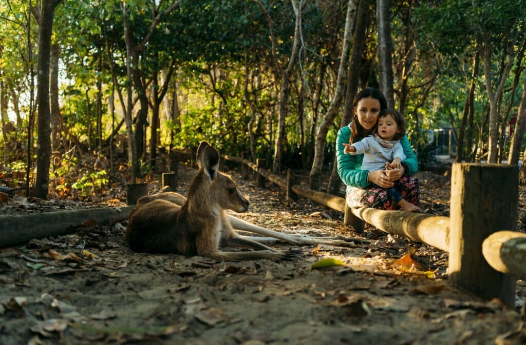 Australia, Queensland, Mackay, Cape Hillsborough National Park, mother and little daughter watching